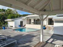 Pool from covered sitting area.