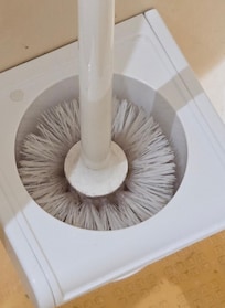 Verschmutzen Klobürste