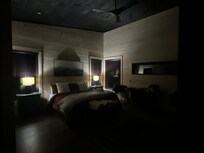 Third floor bedroom. I took this photo because I walked in and it literally looked like a photo from a home magazine