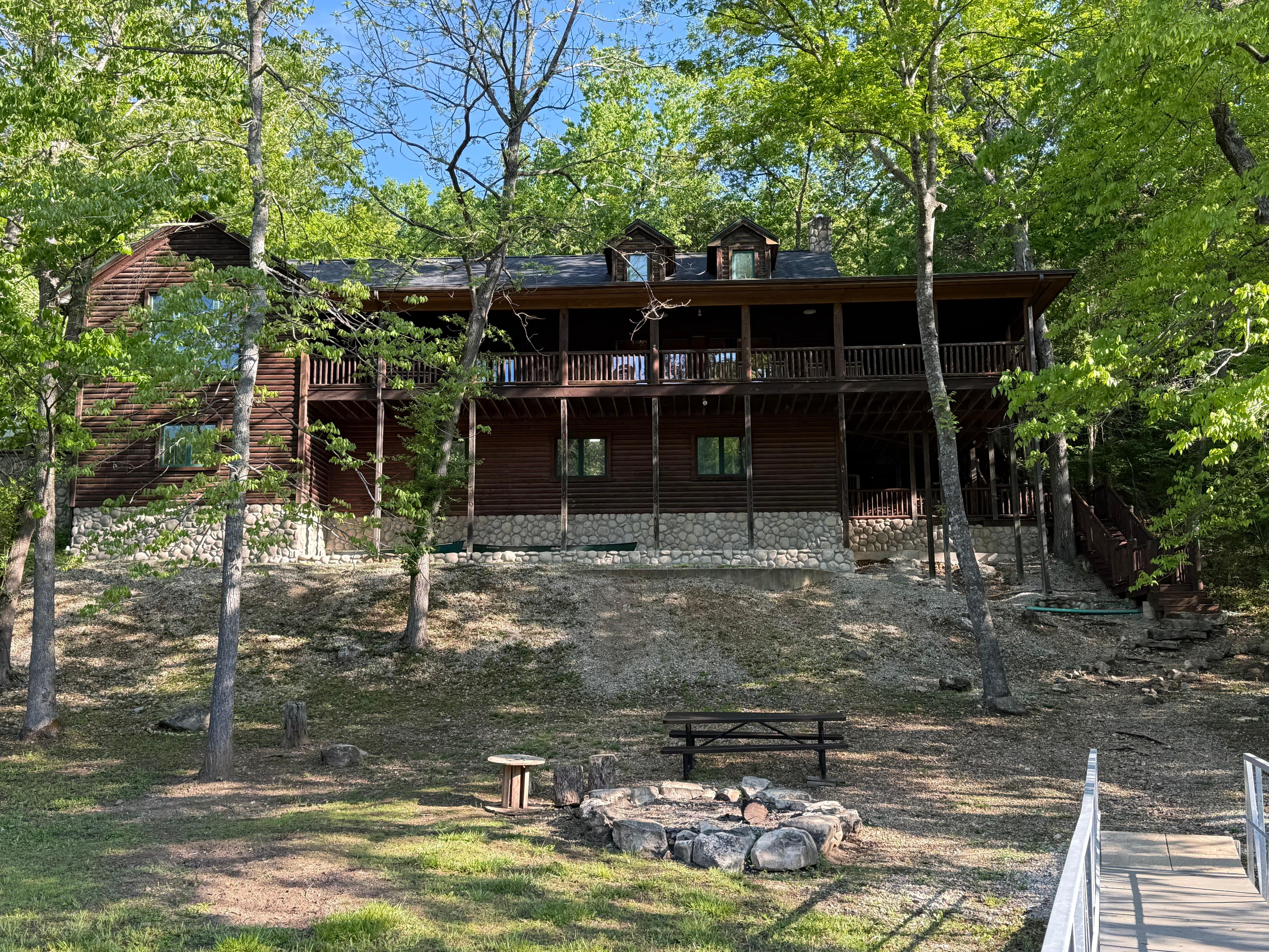 Back of the lodge looking up from the fishing dock. 🎣 