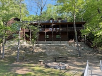 Back of the lodge looking up from the fishing dock. 🎣