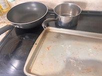 Thrifted Dirty Pots and Pans. The only items provided to cook with.