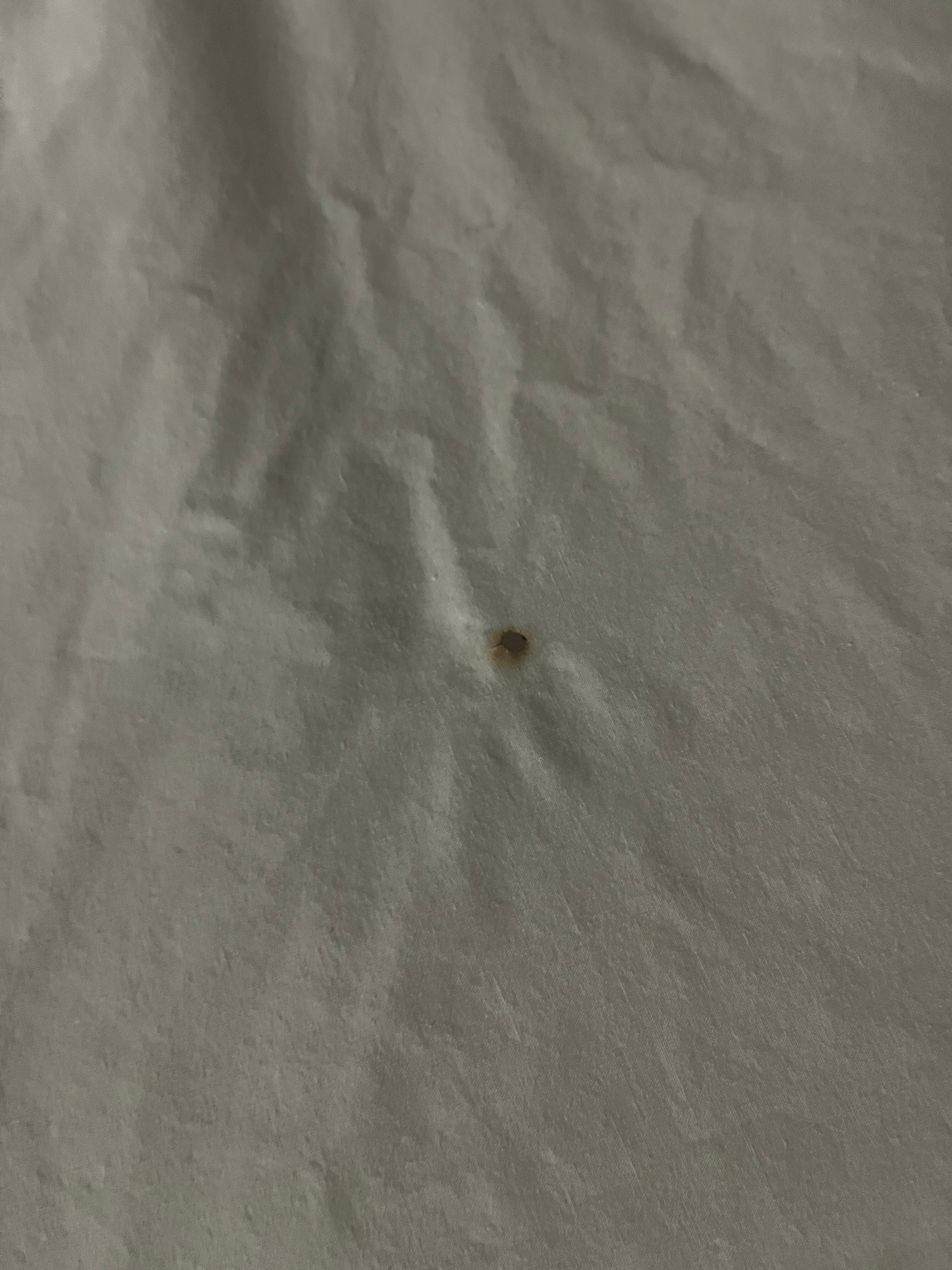 Burn mark in sheet