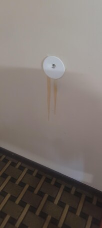 Wll door stop broken with wall stains