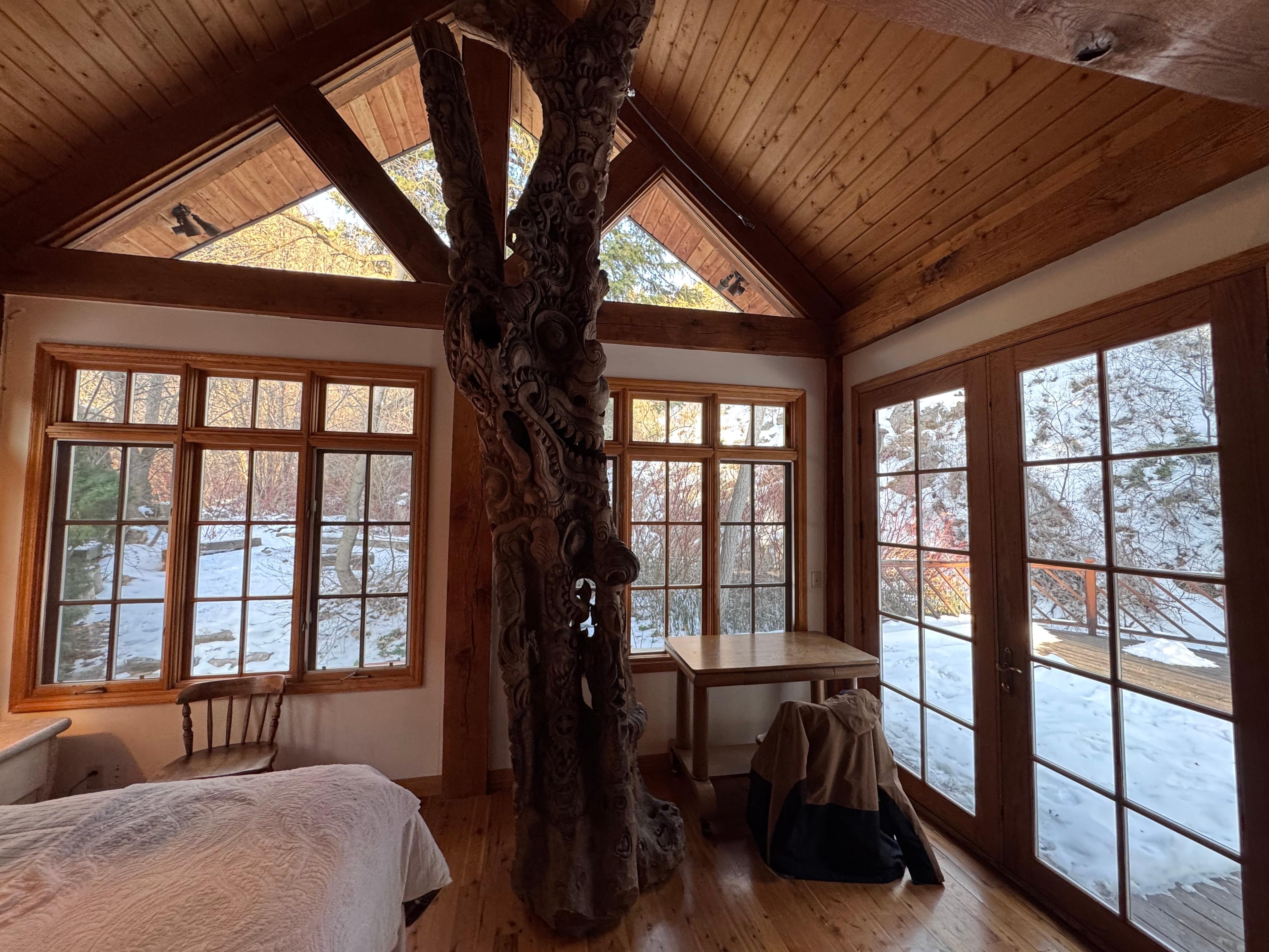 Main bedroom with  amazing tree carving! 