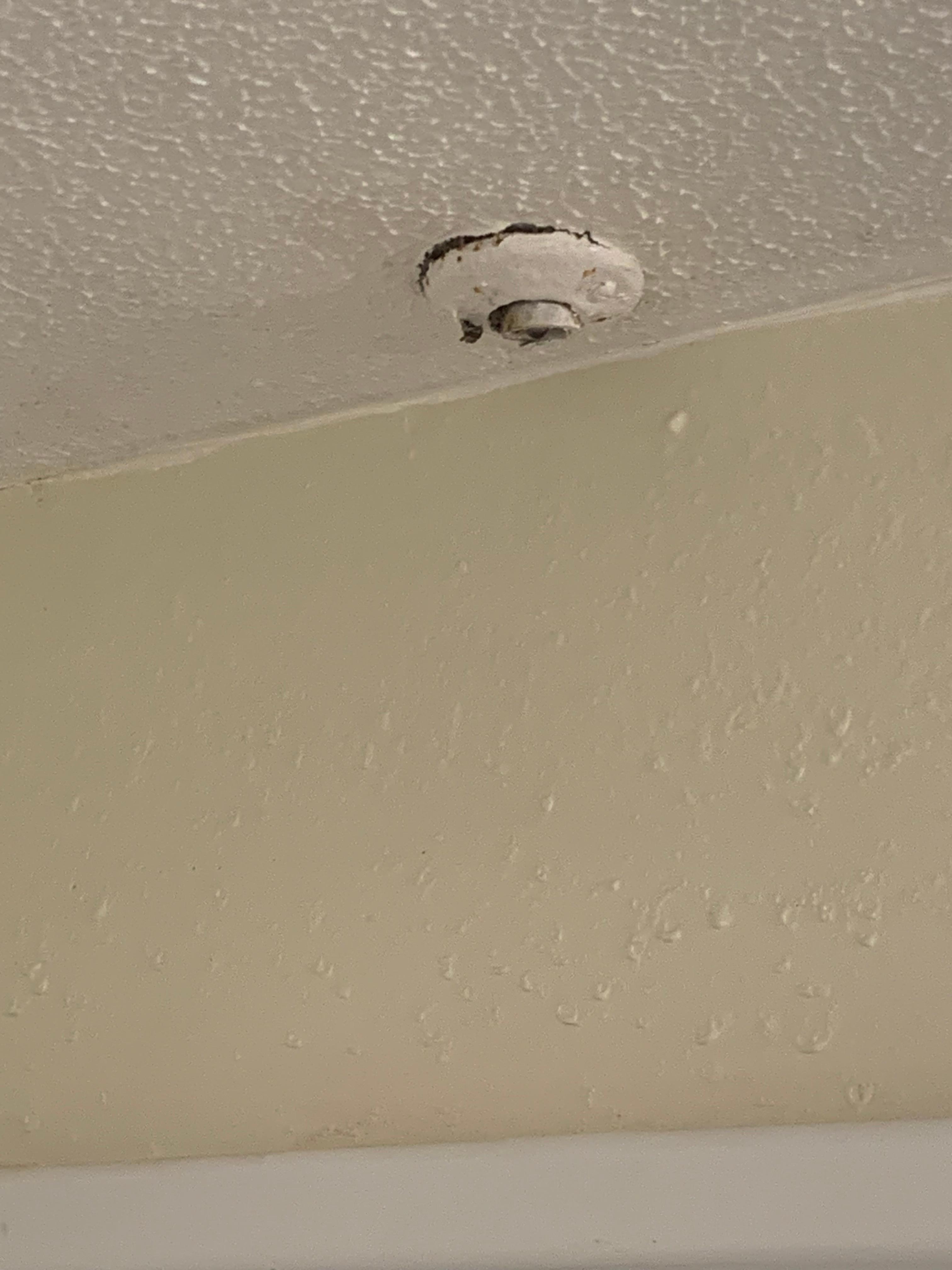 AC dripping into tub from ceiling