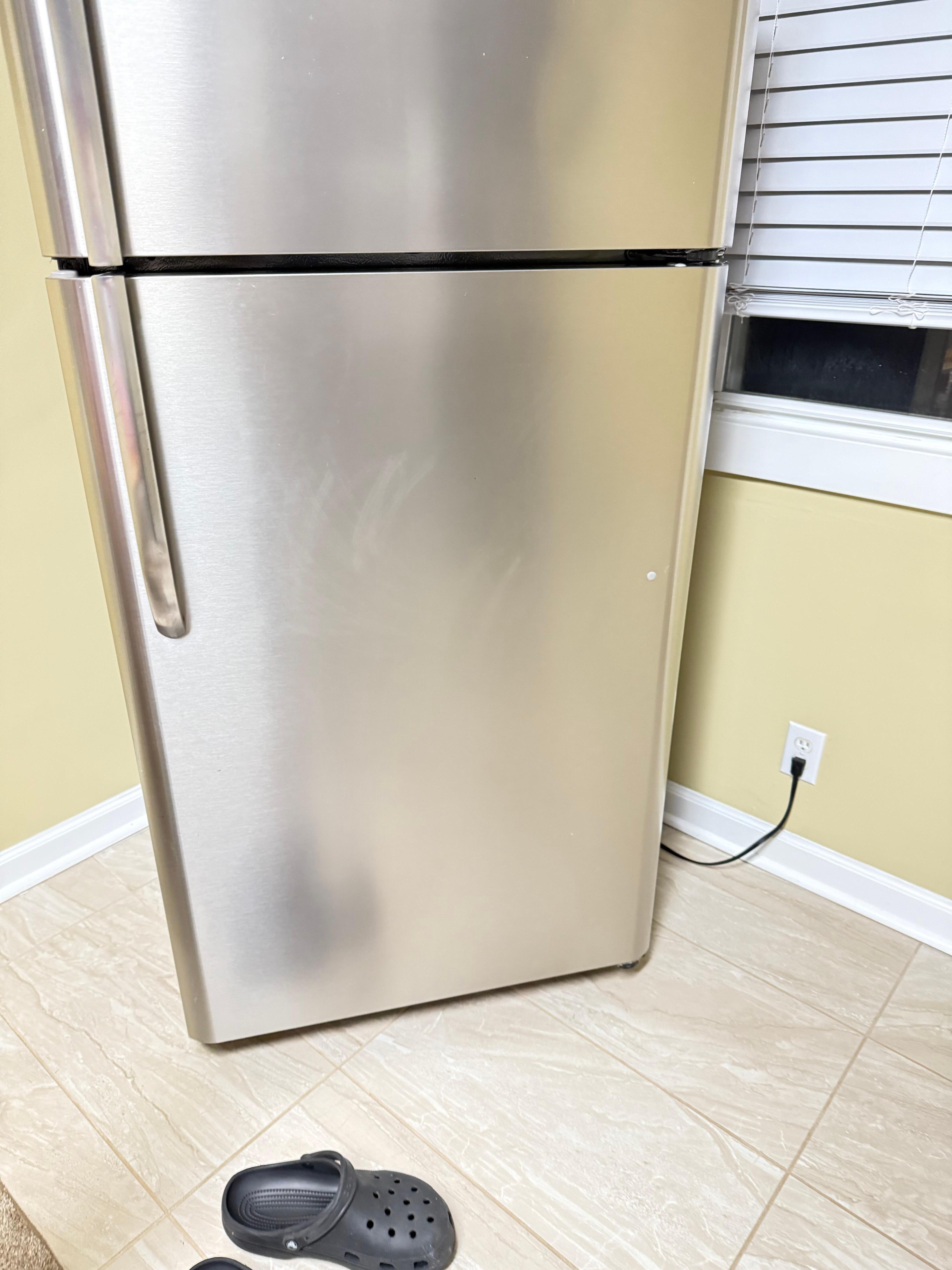 Dirty fridge. Dented
