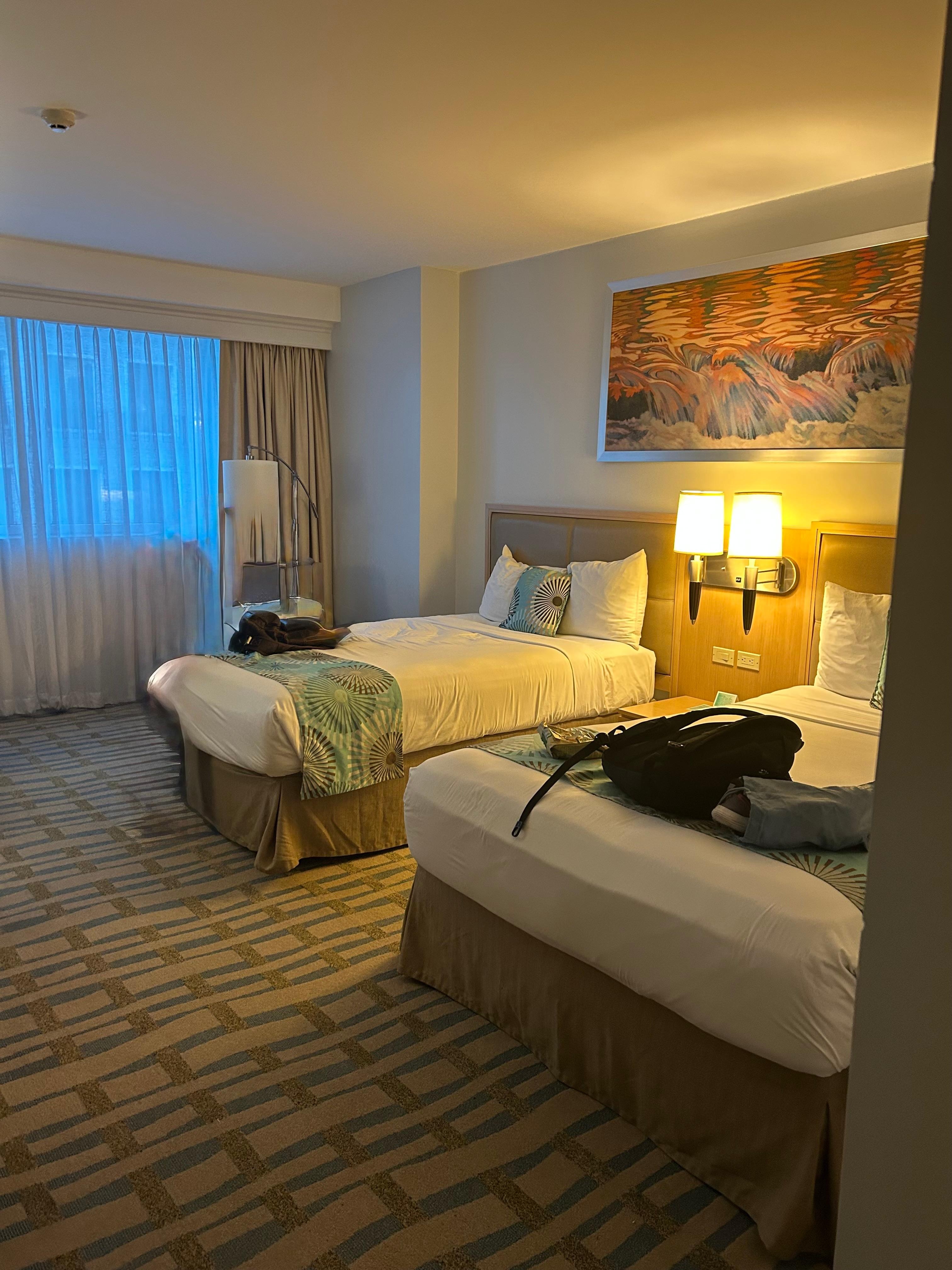 The bedroom portion of the suite is almost exactly like the regular rooms, except for an extra bench