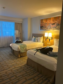 The bedroom portion of the suite is almost exactly like the regular rooms, except for an extra bench