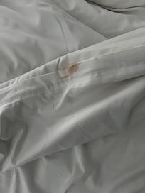 Makeup stain on the comforter cover