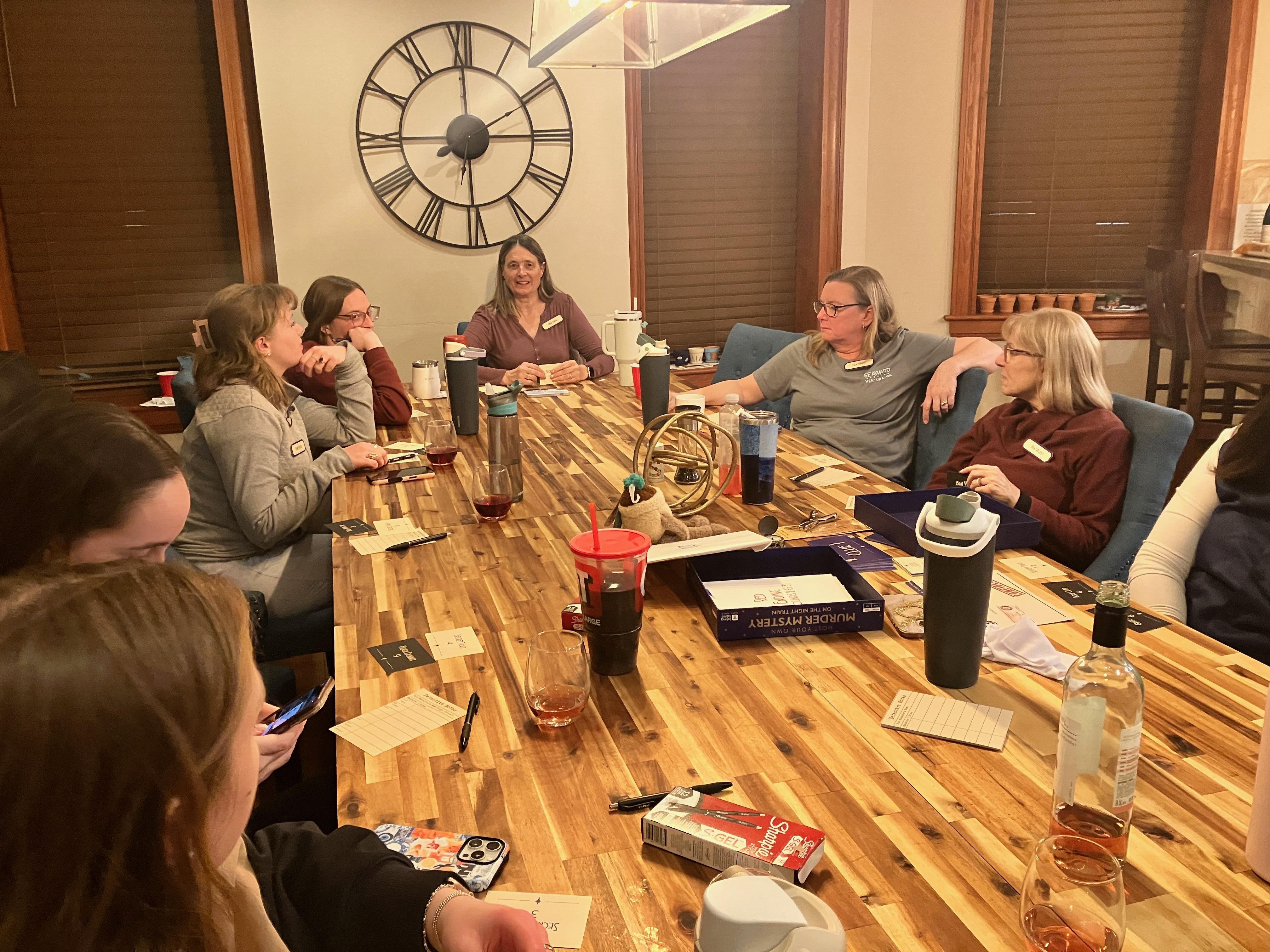 We played a murder mystery game at the large table. So much fun. 