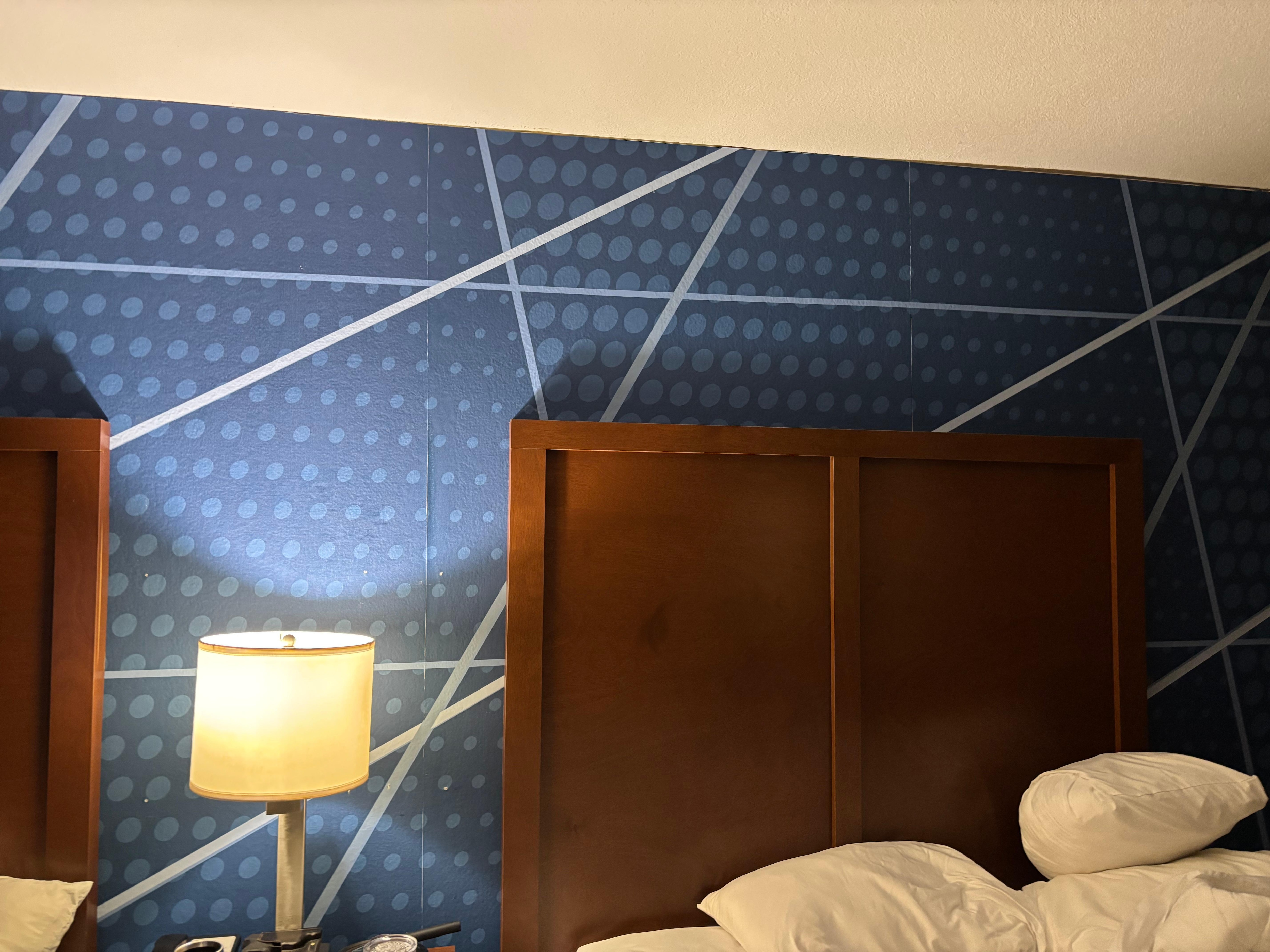 Wallpaper behind beds a bit much?