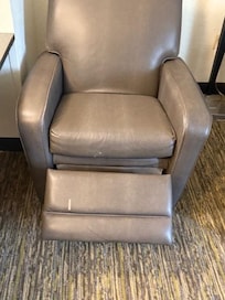 Chair doesn't fully close. it is torn in the rear as shown by the next picture.
