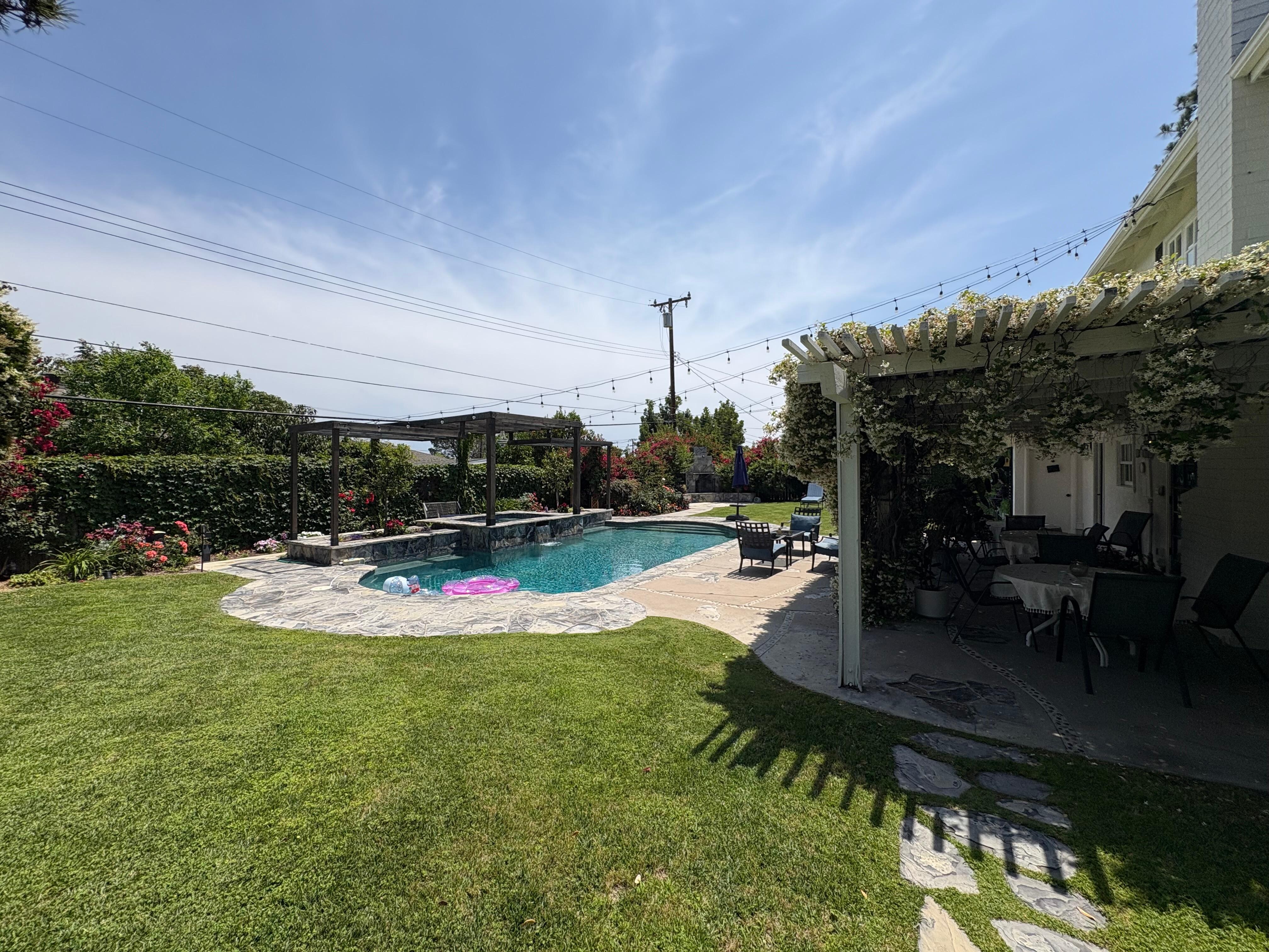 Huge backyard with tons and tons of flowers 