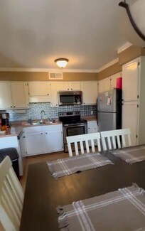 Nice size kitchen and adequately supplied with utensils