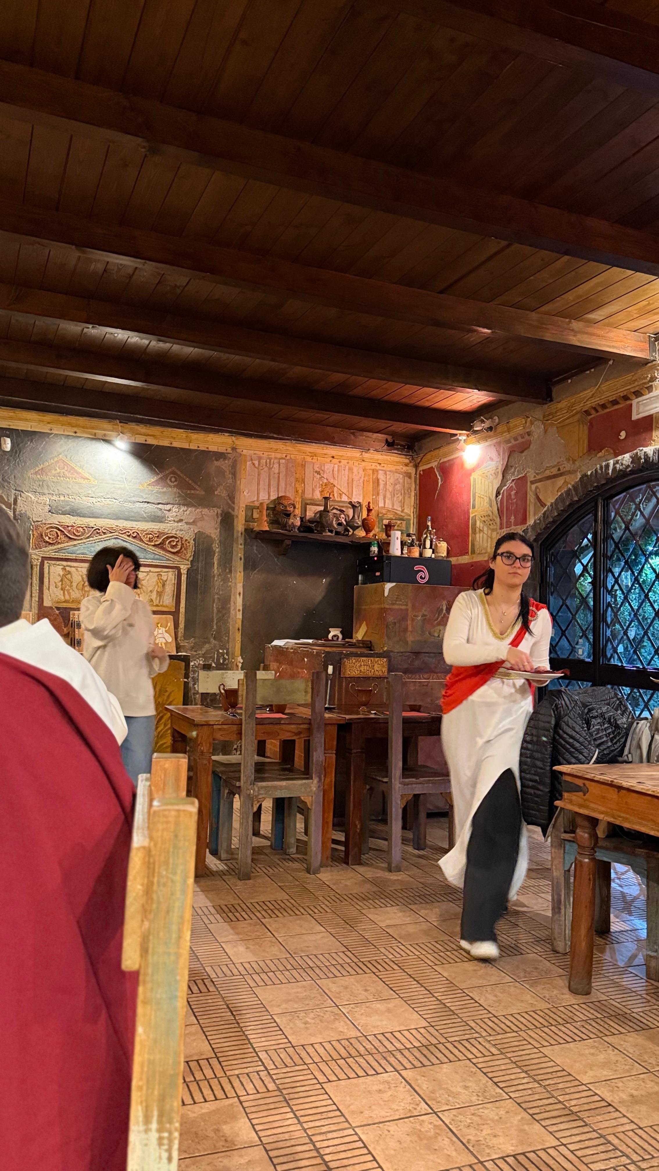 You will be dressed up at the Caupona restaurant. Beautiful place, wonderful food and excellent service 
