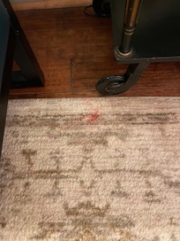 Red stains on the carpet