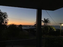 san remo sunset from loungeroom of salty paws