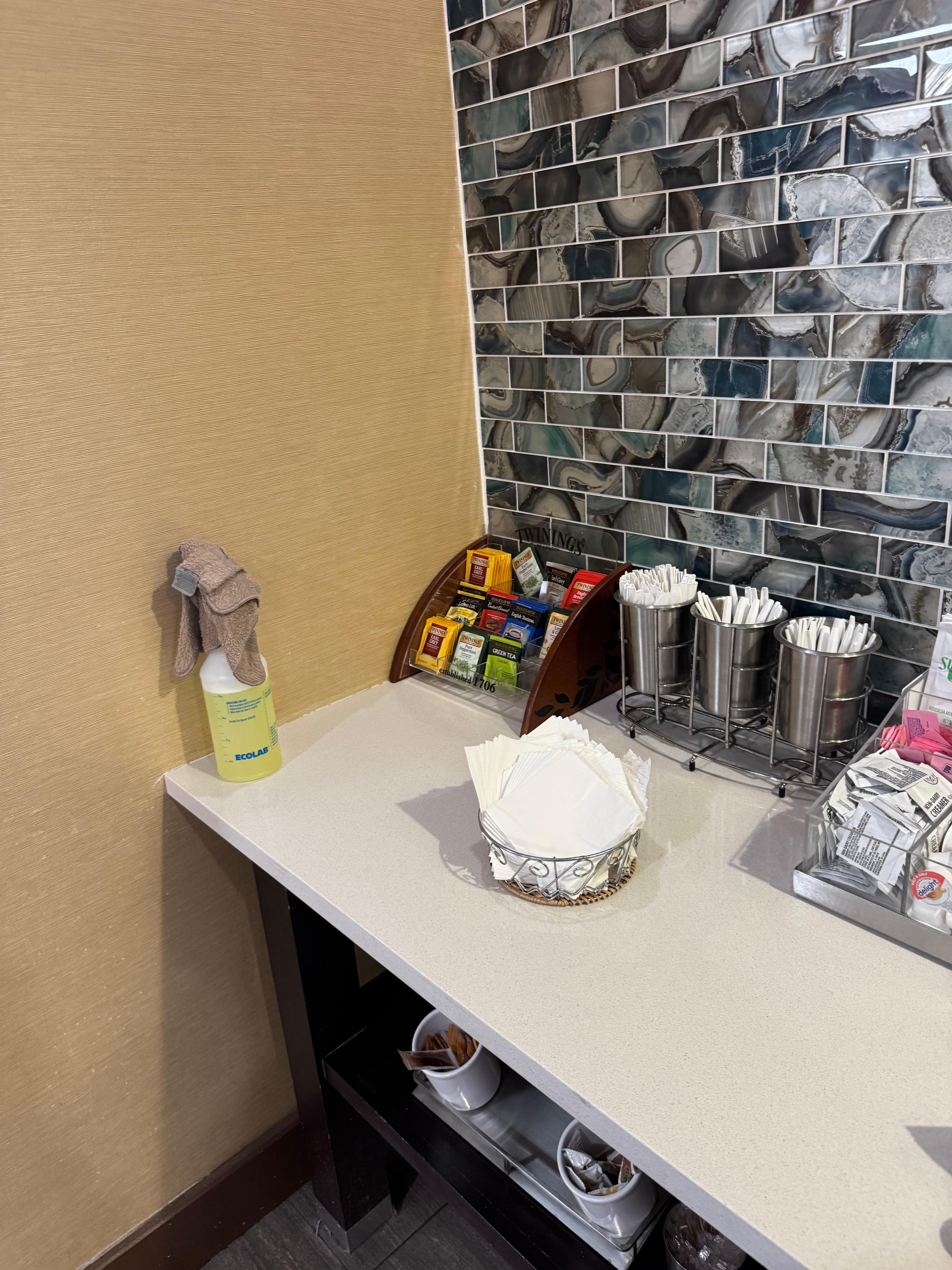 Cleaning rag and cleaner at tea station. 