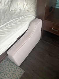 Night stand is blocked by a wall making it useless!