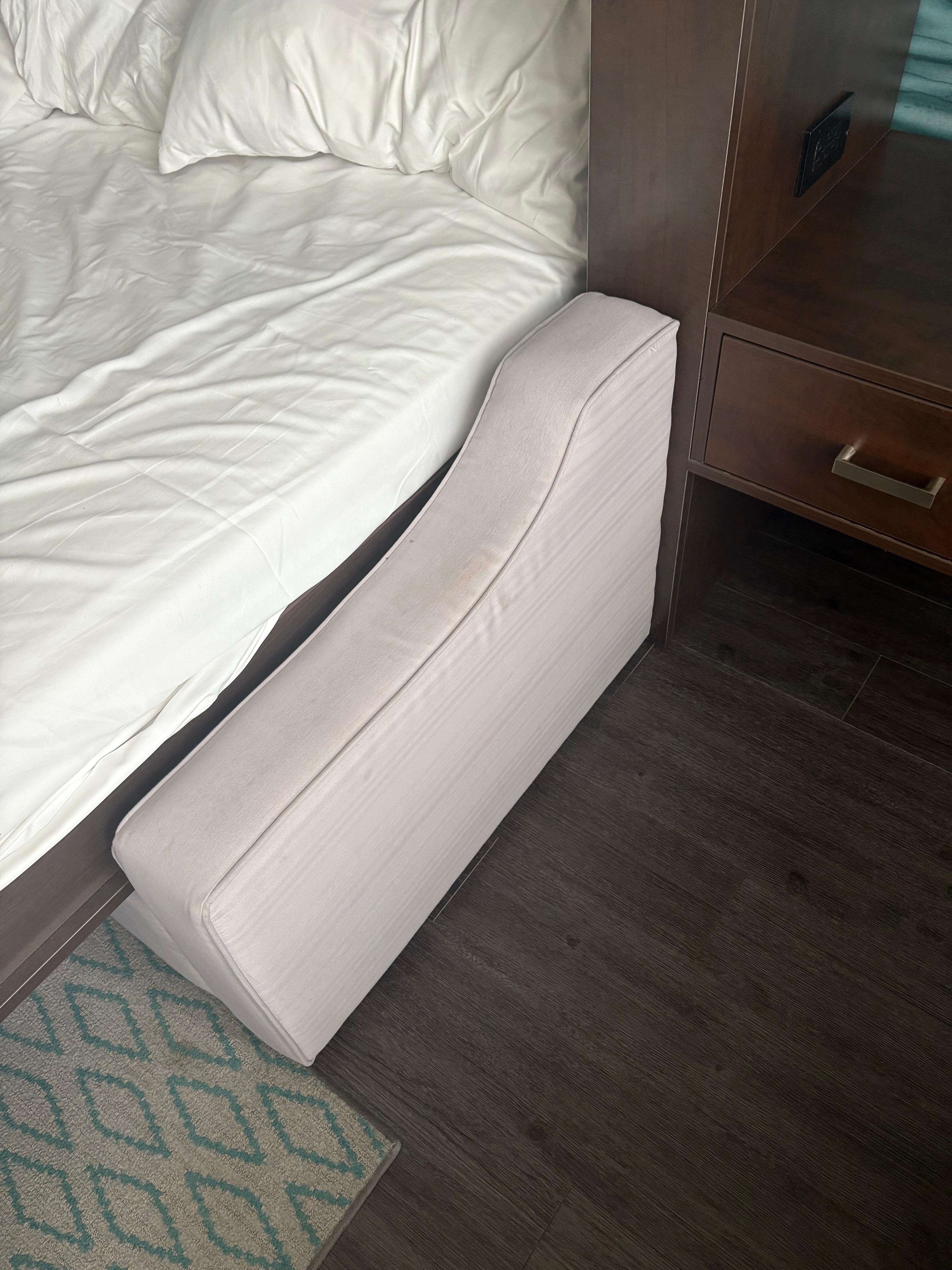 Night stand is blocked by a wall making it useless!