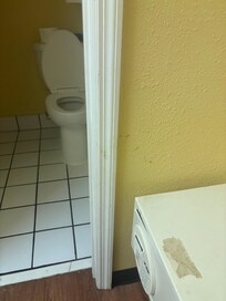 Door frame Entry to bathroom.