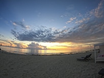 The beach is beautiful and clean. Staff and service are excellent and drinks are very good.