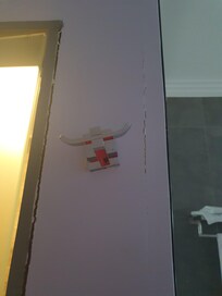 Hooks hanging out of wall and in need of maintenance and revamp