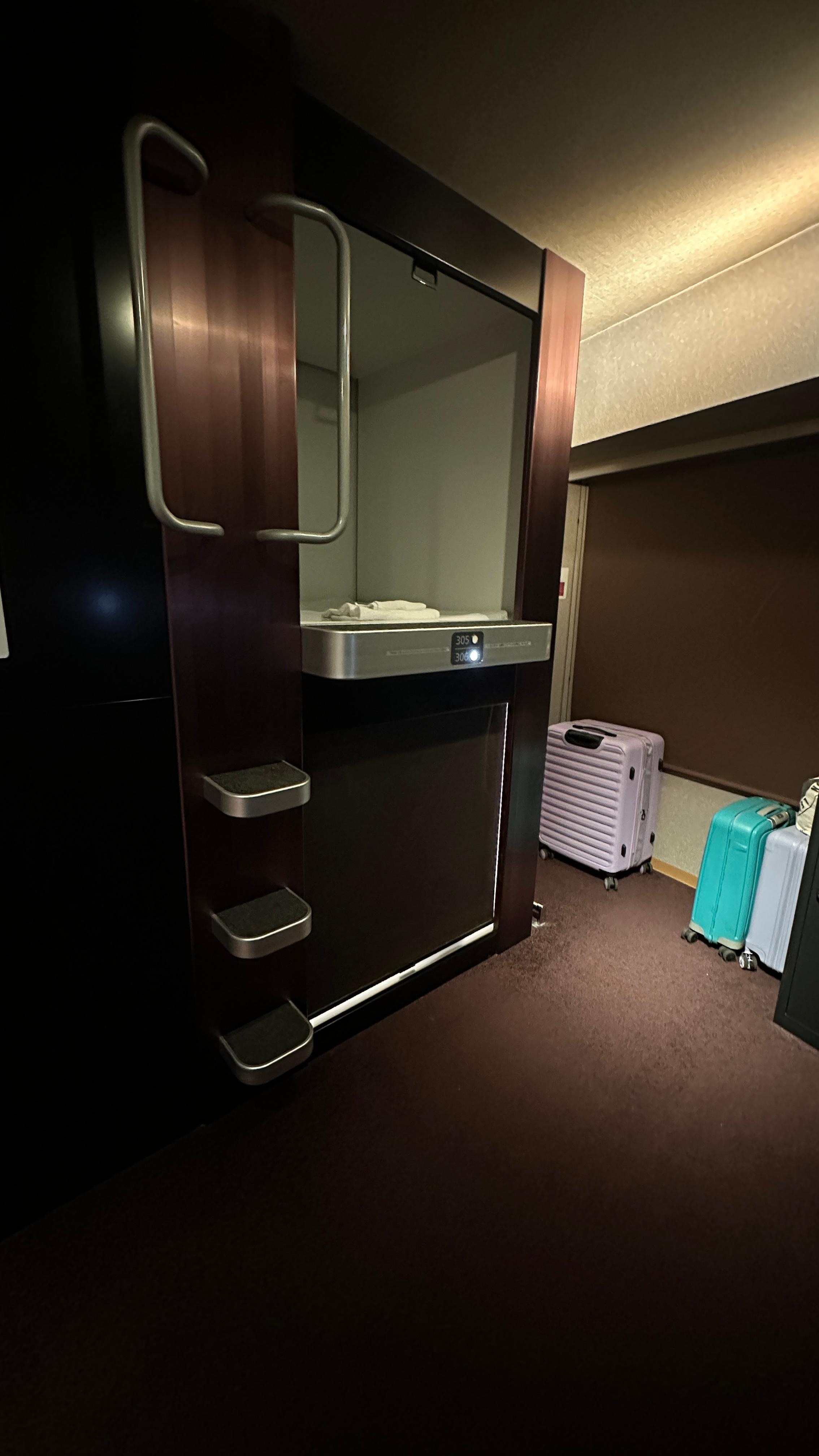 Sleeping pod/bed with pull down blind