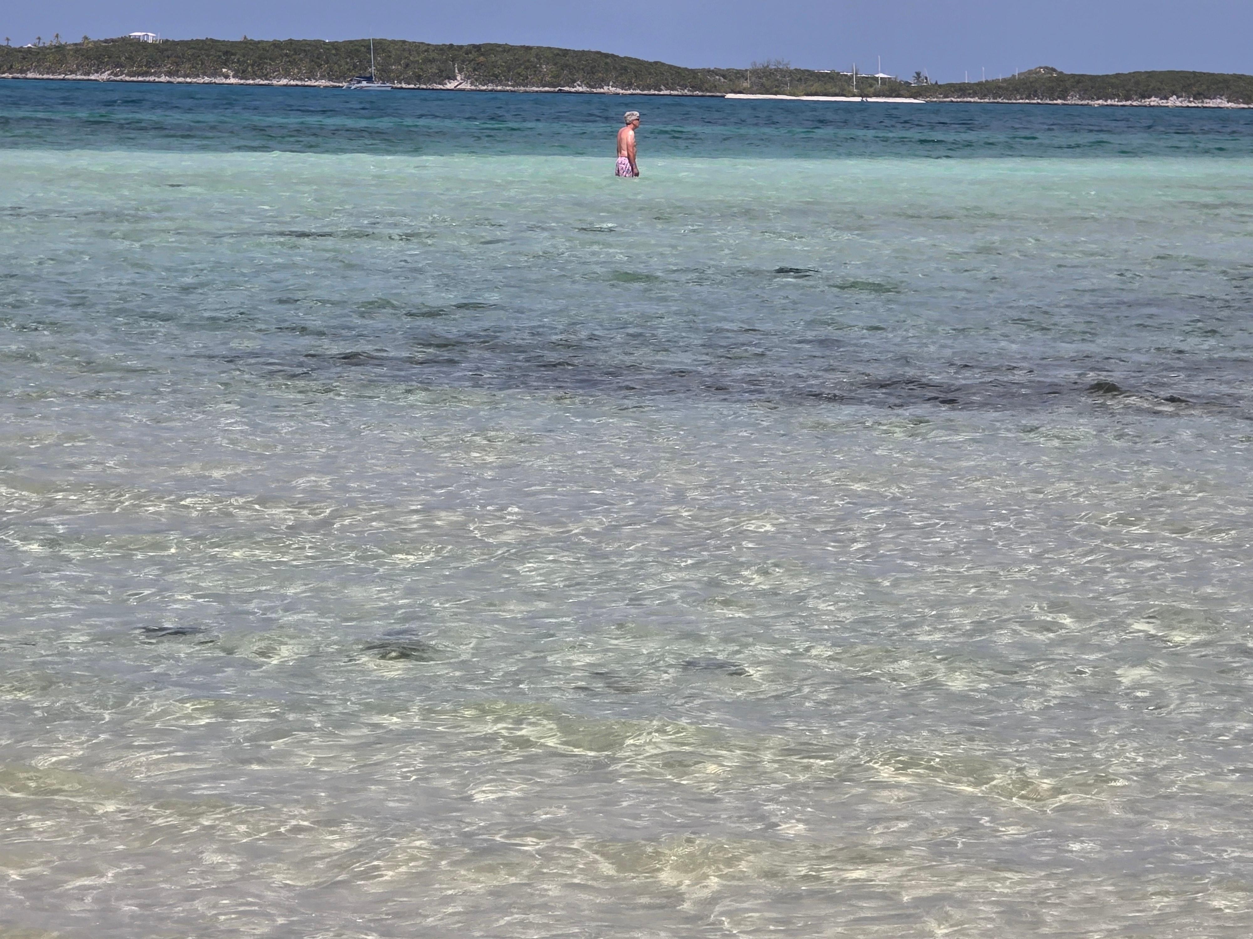 You can walk out forever in the calm ocean from the beach in front of the villa.