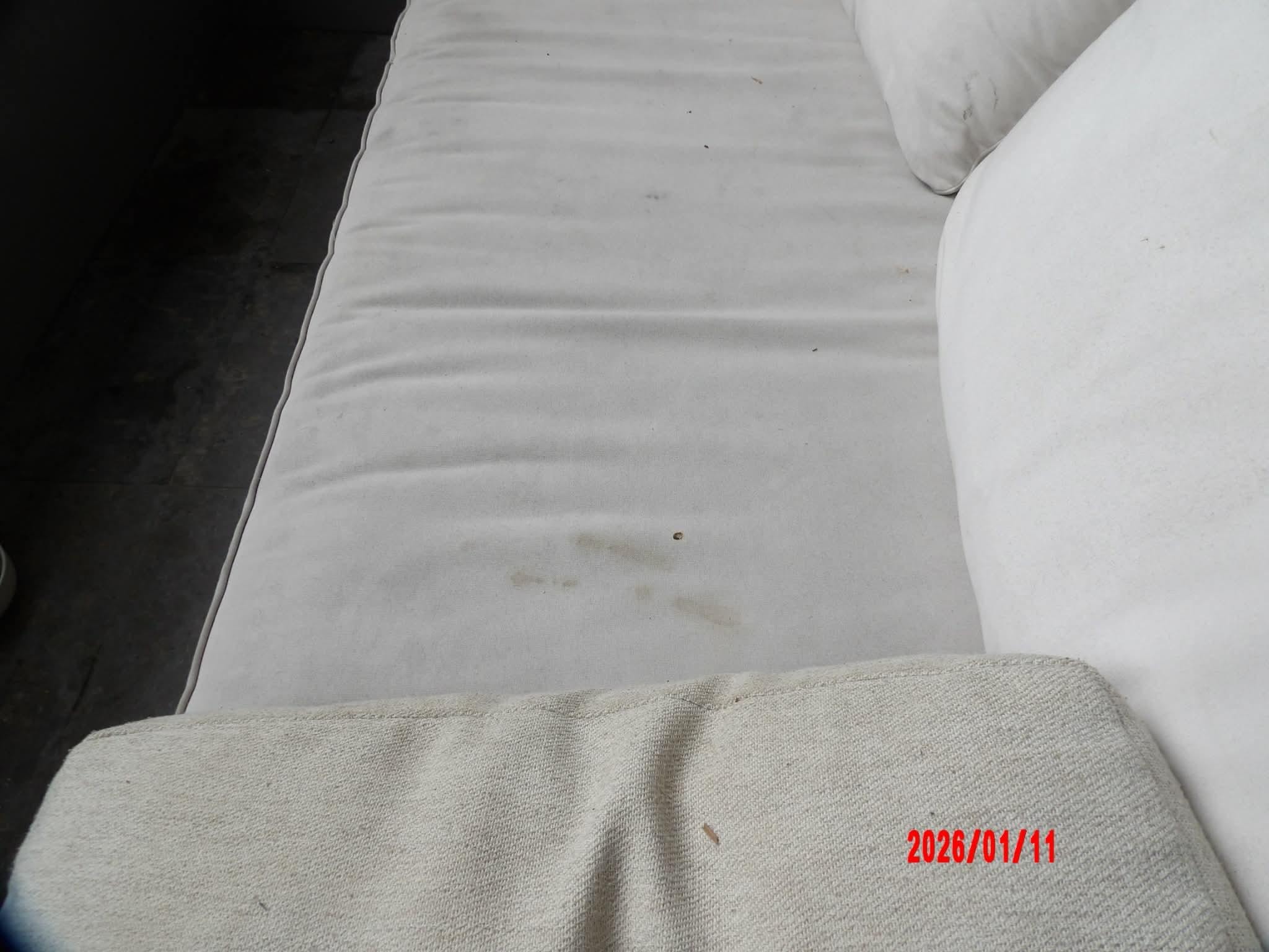 Patio couch stained and burned too