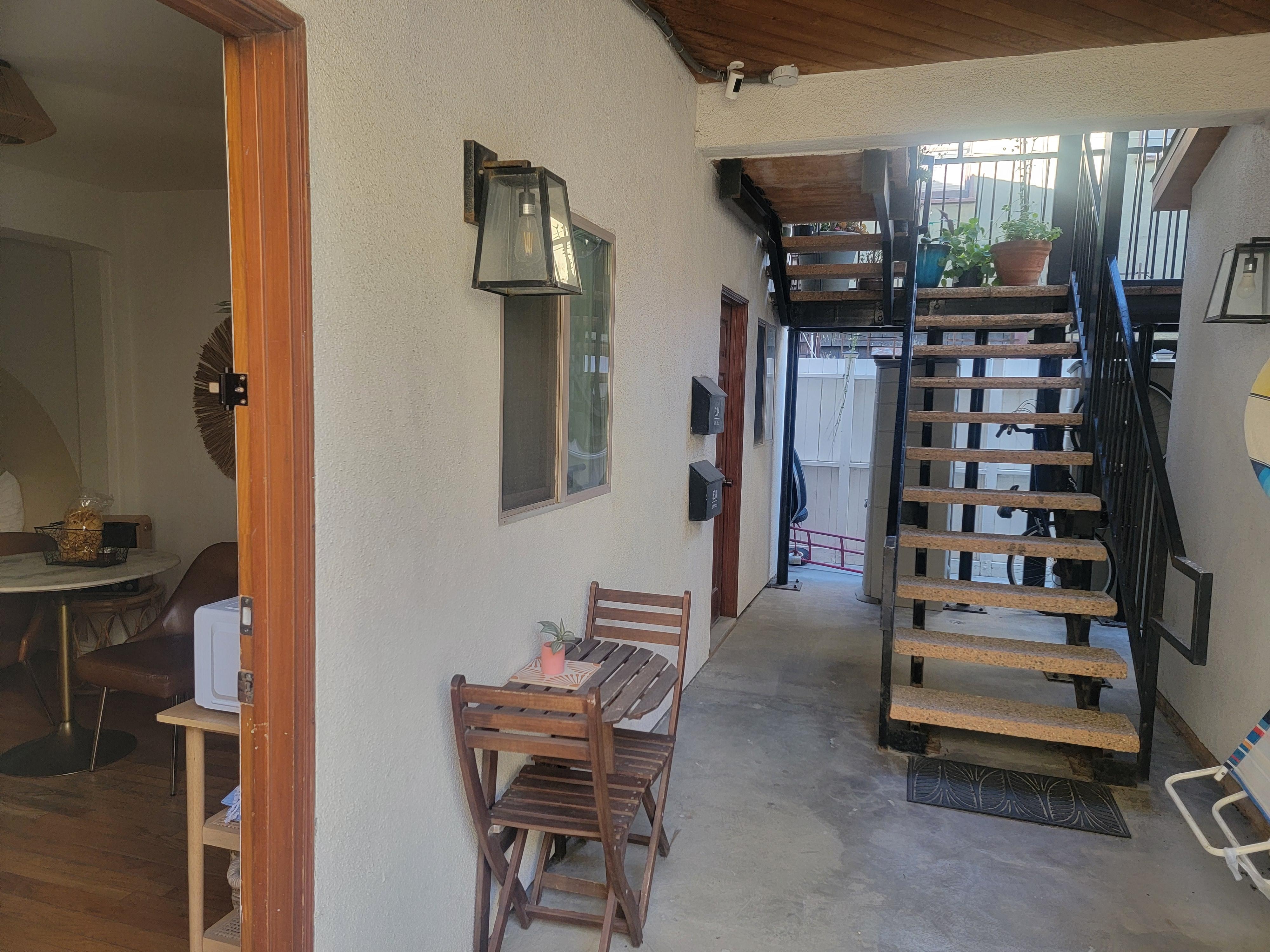 Outdoors has a very small sitting area