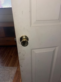 Black filth on the inside living room door