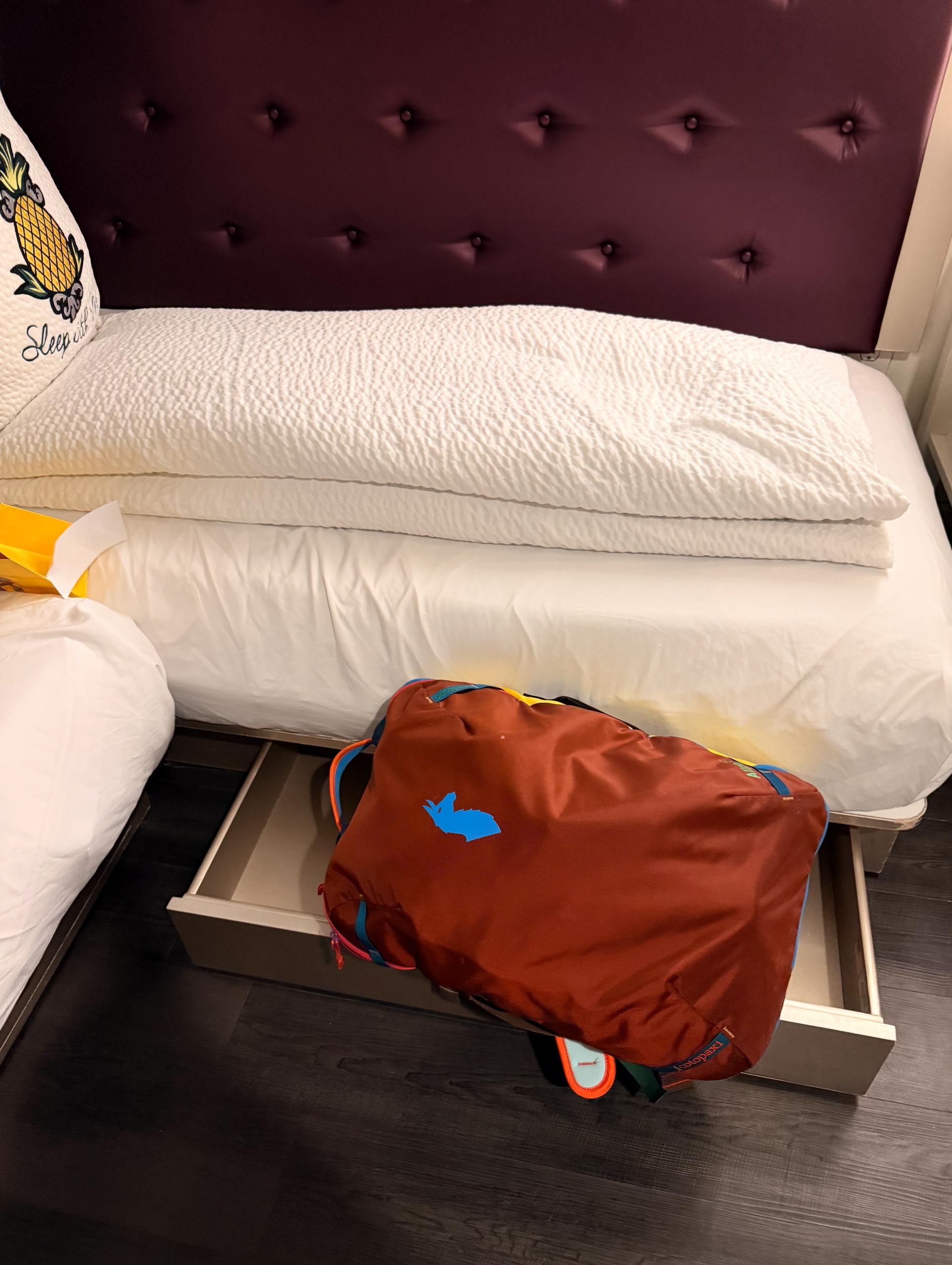 The under-bed luggage storage