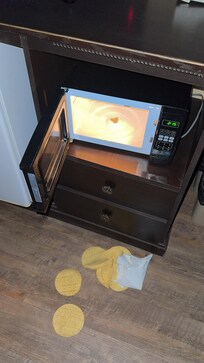 I opened the microwave and it was wrapped in paper towels I took it out to throw away and it fell