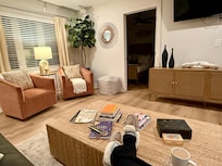 Large comfortable living room with AMAZING throw pillows!