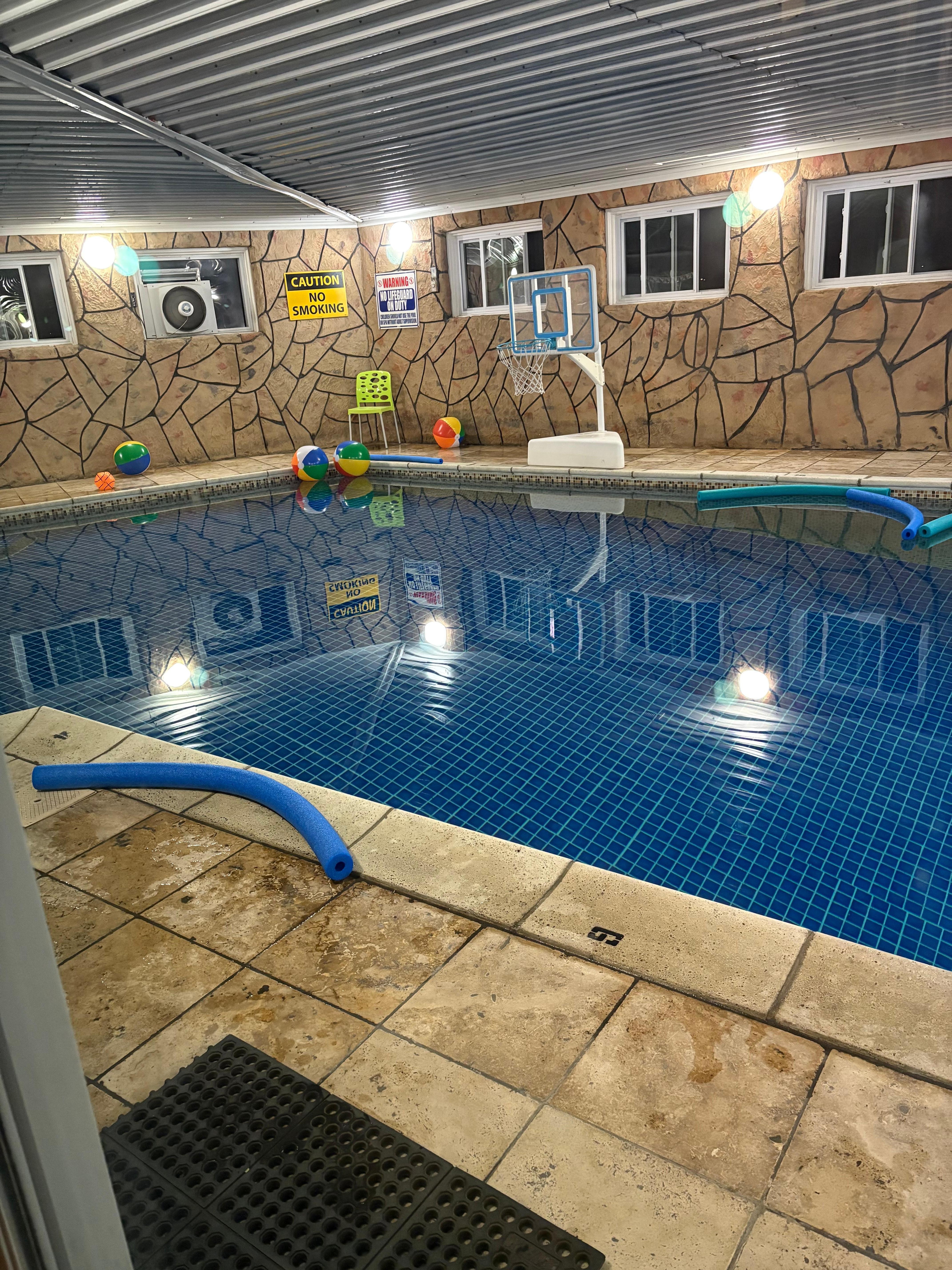The pool water was so clear and there were floats and balls for the kids. 