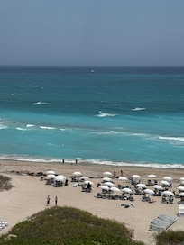 Beach view from room of chairs