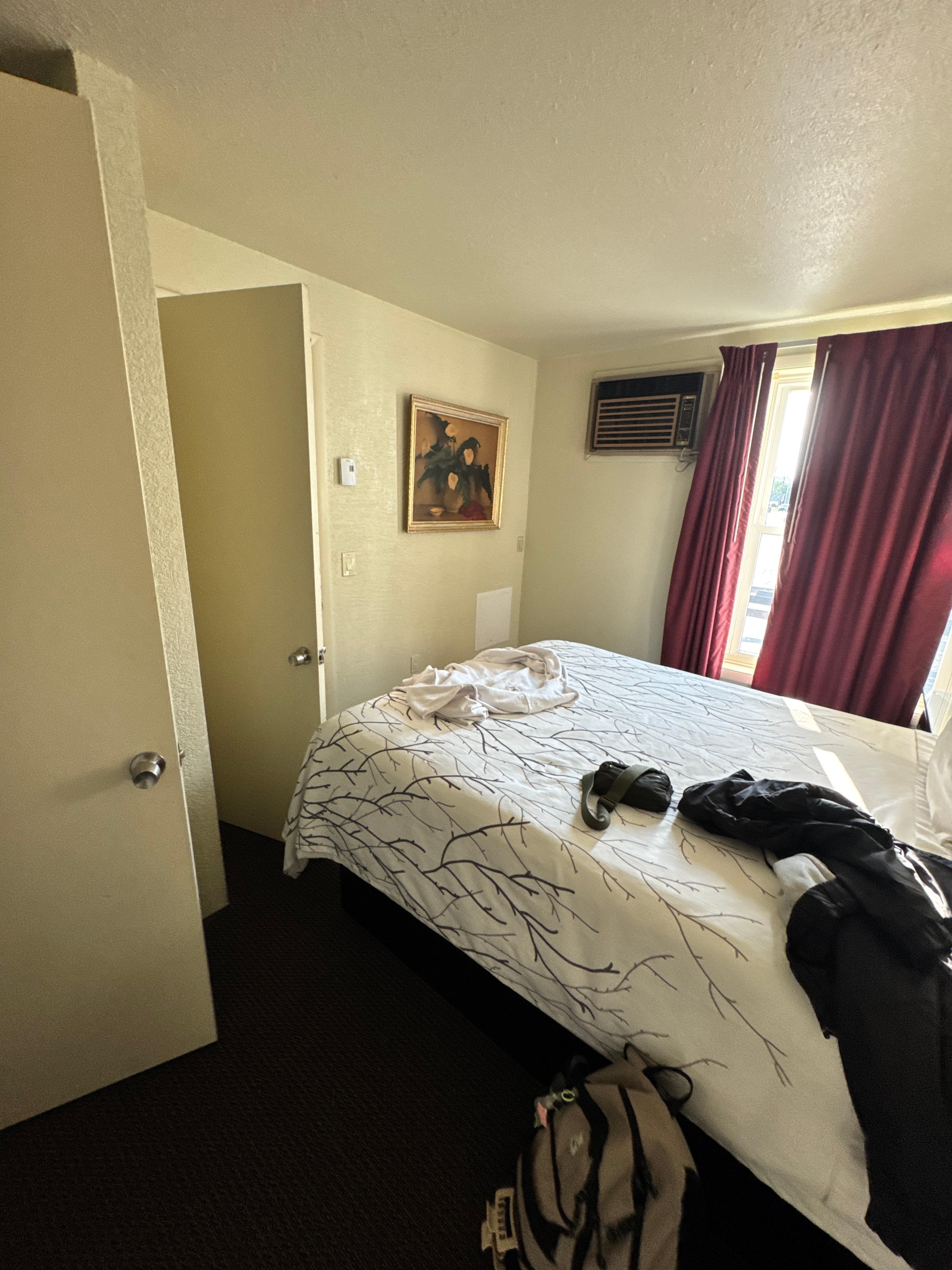 Doors connecting to the main space and bathroom