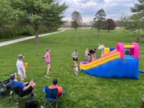 Put up our bounce house outside. Plenty of lawn for outside play