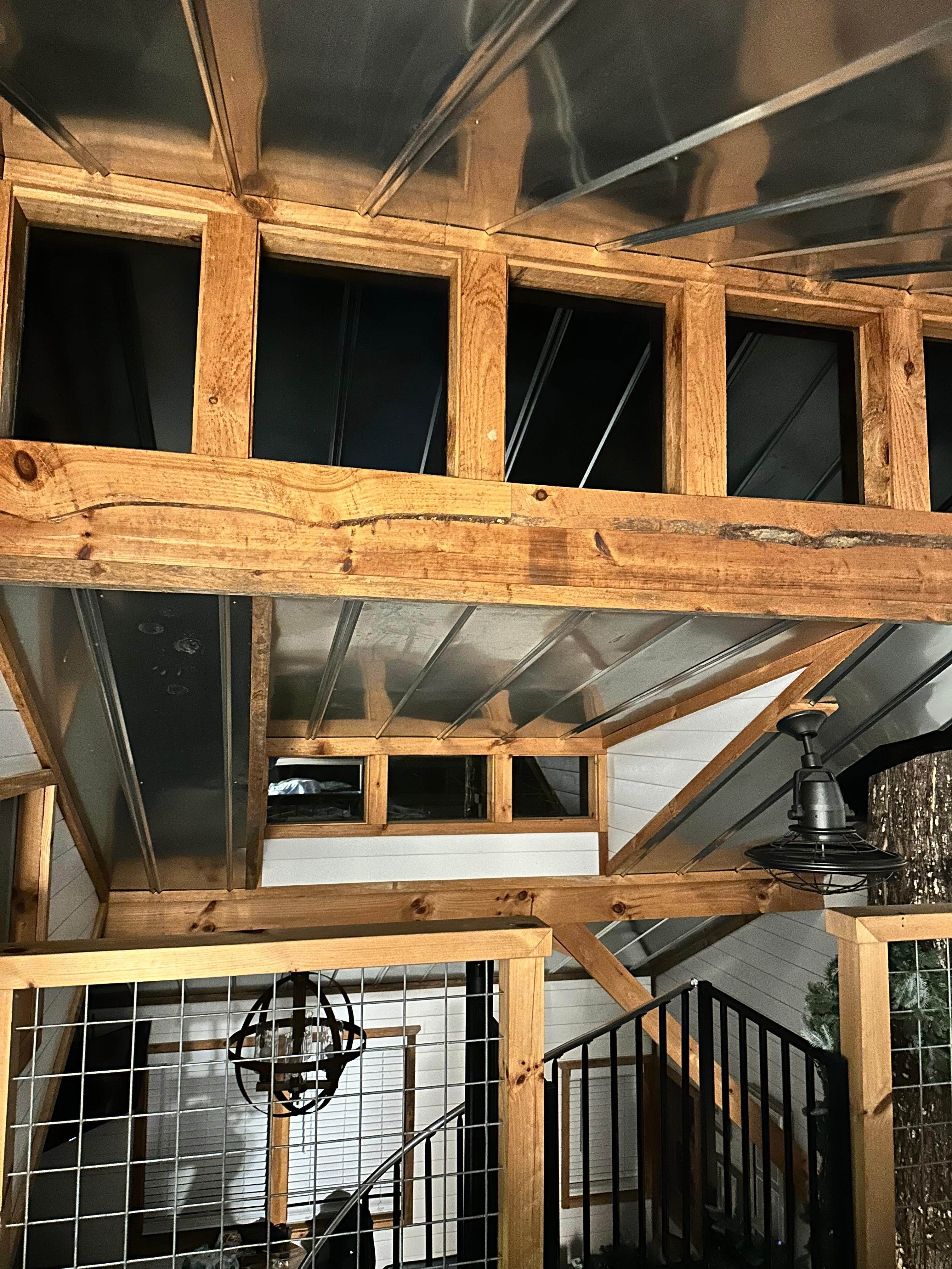 Windows to gaze at the night sky while laying in bed