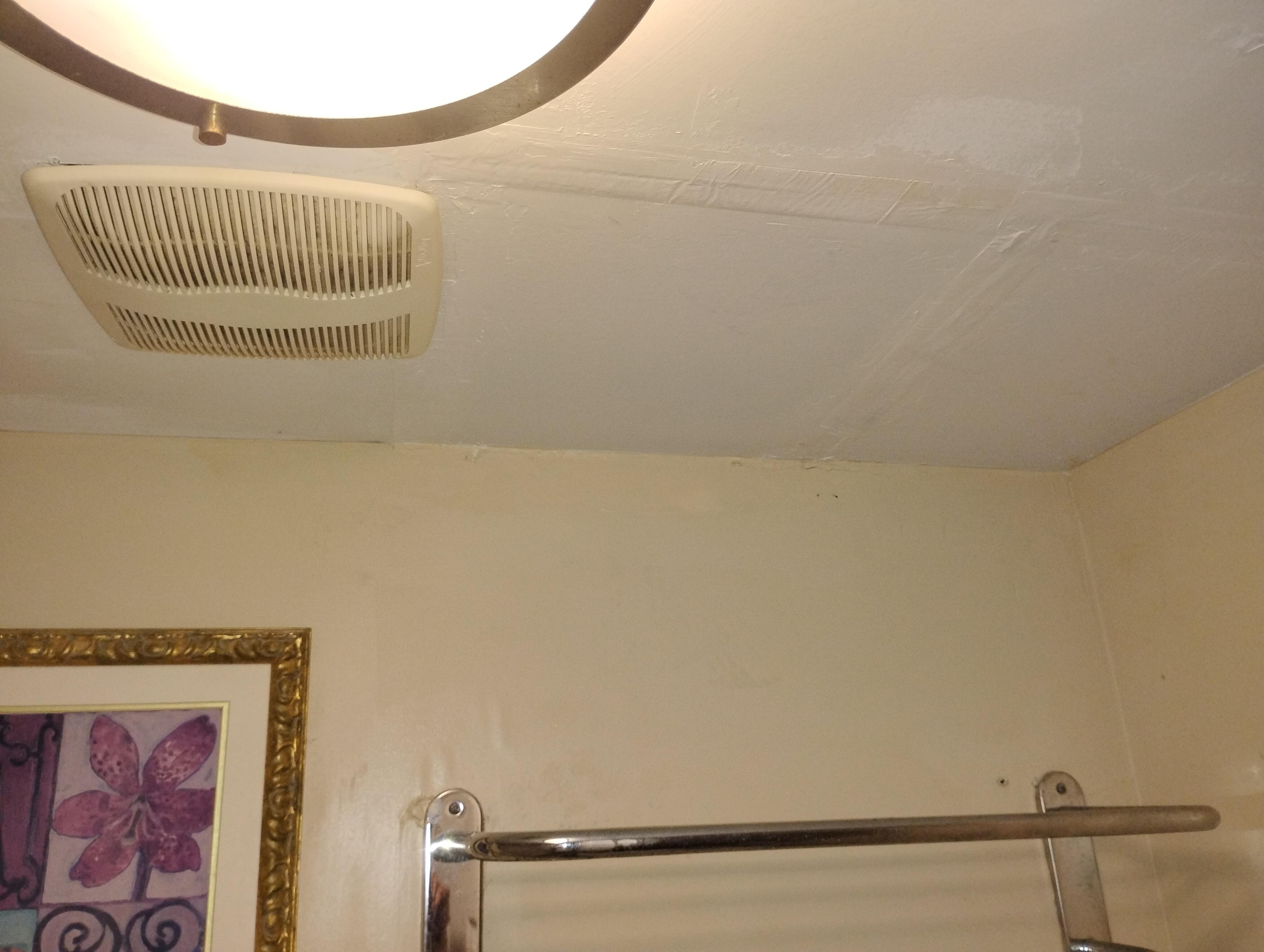 Mold that has been painted over in the bathroom