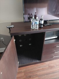 The spot where the missing refrigerator is supposed to be.