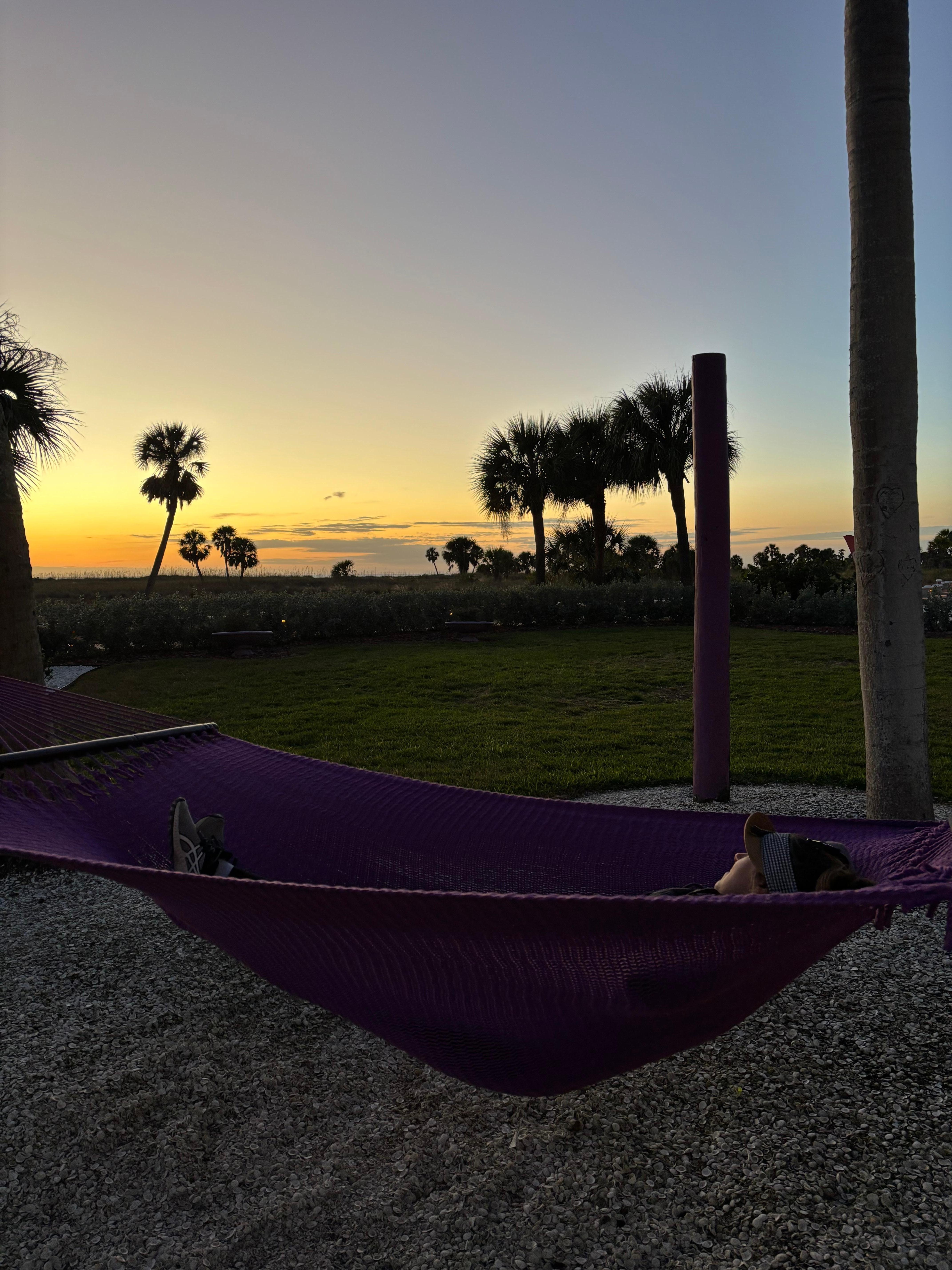 Resting in the hammock with sunset in the back