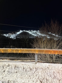 A view of Beech Mountain at night during a drive on a nearby road.