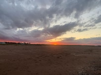 From the nearby beach.