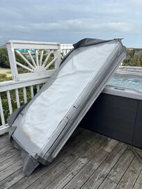 This is the hot tub cover in very poor shape and hard to use