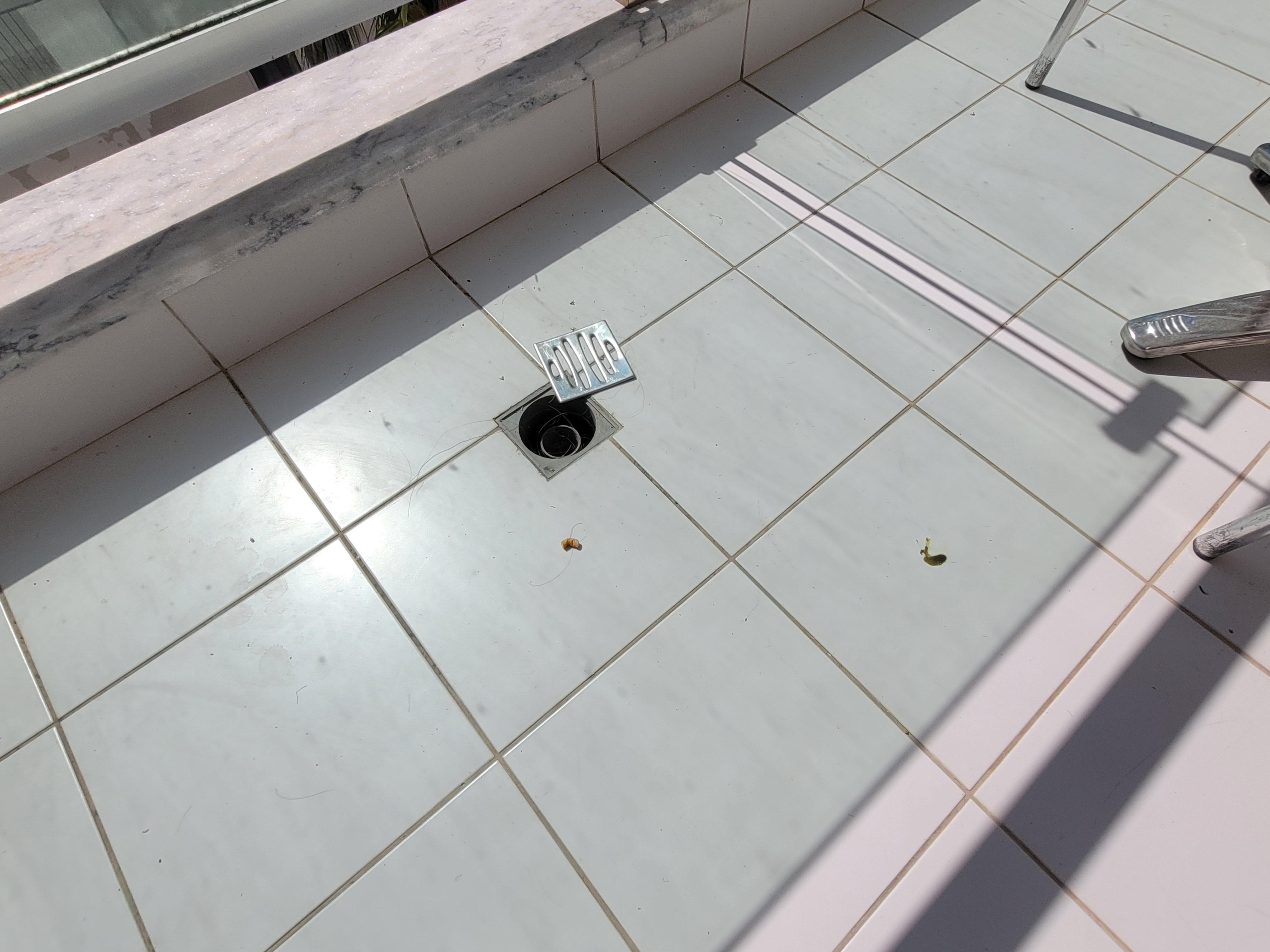 Cigarette butt on the balcony floor