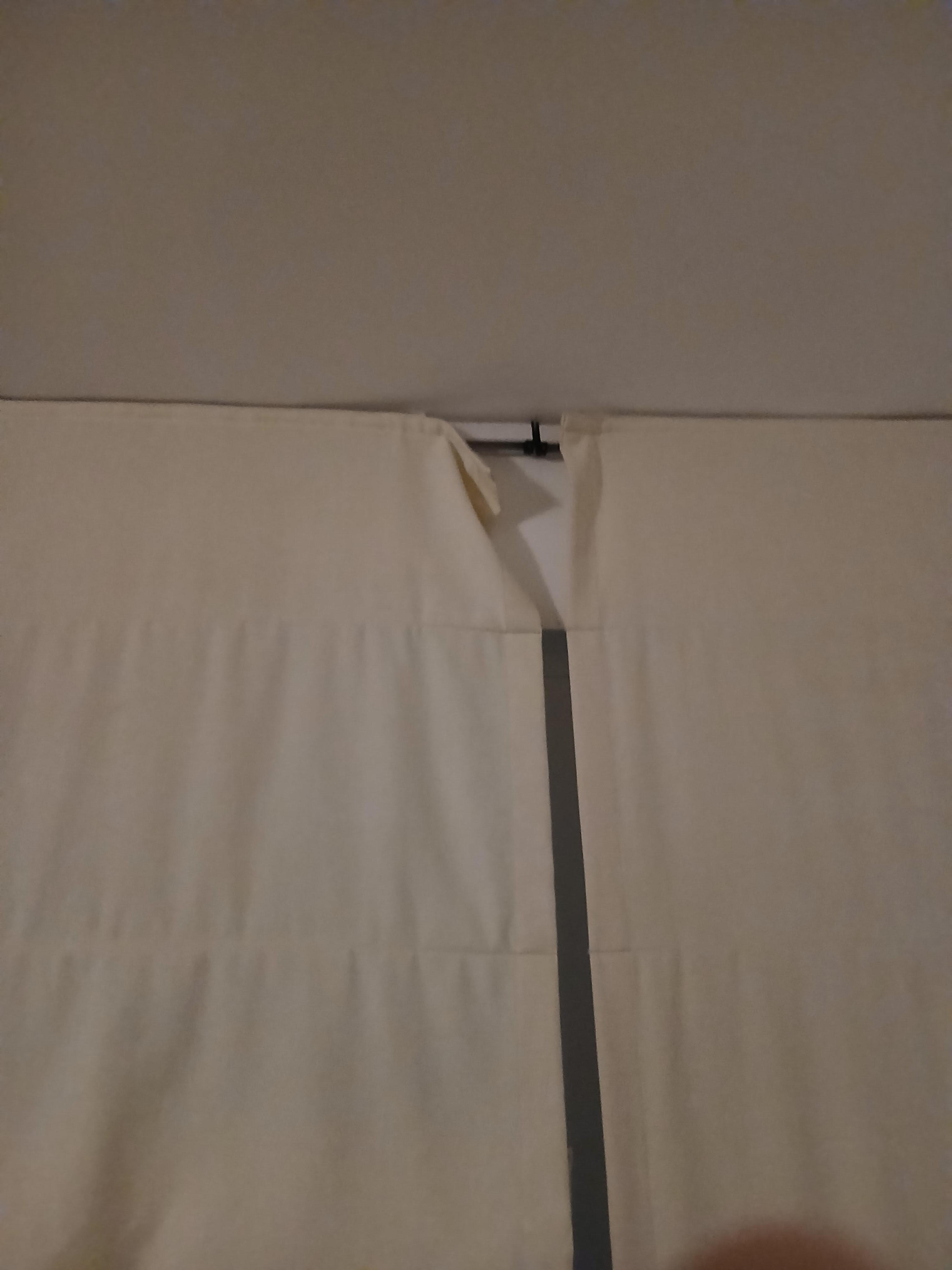 curtain in room broken