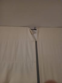 curtain in room broken
